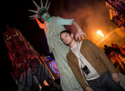 <p>Watch out behind you, Elijah Wood! (Photo: Nate Weber / Universal Studios Hollywood) </p>