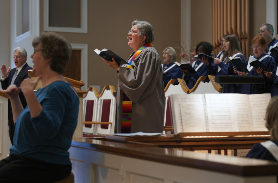 The Rev. Linda Barnes Popham sings with the choir at Fern Creek Baptist Church during a service, Sunday, May 21, 2023, in Louisville, Ky. In February, Fern Creek was one of five churches disfellowshipped from the Southern Baptist Convention because they have female pastors. But Fern Creek Baptist and Saddleback Church of California have decided to appeal. The challenge will be voted on at the upcoming SBC annual meeting. (AP Photo/Jessie Wardarski)