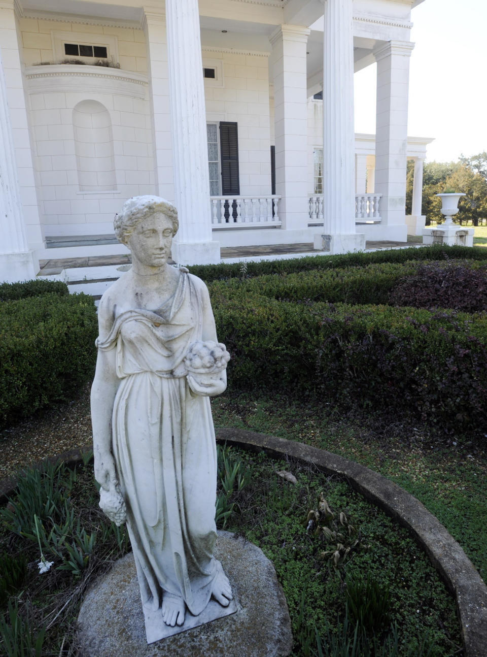 In this Jan. 30, 2020 photo. Gaineswood, an antebellum plantation house in Demopolis, Ala., is seen.The home's entry in the National Register of Historic Places doesn't mention its ties to slavery. An Associated Press review found that many register entries for pre-Civil War plantations virtually ignore slavery. (AP Photo/Jay Reeves)