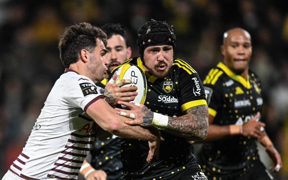 La Rochelle's English wing Jack Nowell is tackled by Bordeaux-Begles' French wing Damian Penaud during the French Top14 rugby union match between Stade Rochelais (La Rochelle) and Union Bordeaux-Begles (UBB) at The Marcel-Deflandre Stadium in La Rochelle, western France on november 19, 2023