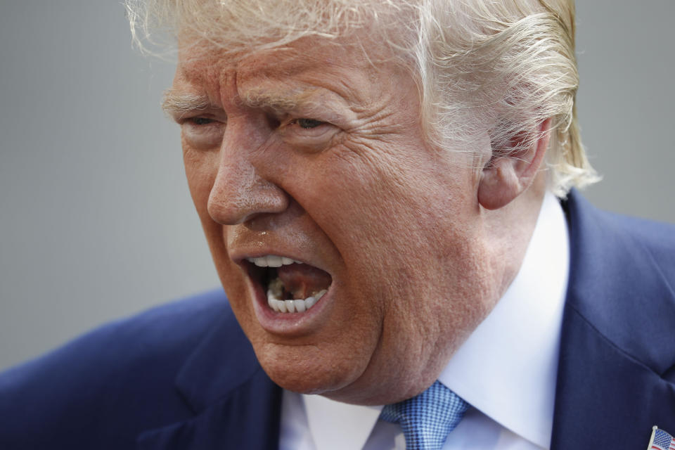 President Donald Trump speaking to the media on the South Lawn of the White House in Washington, Friday, Oct. 4, 2019, before his departure to nearby Walter Reed National Military Medical Center in Bethesda, Md. (AP Photo/Pablo Martinez Monsivais)