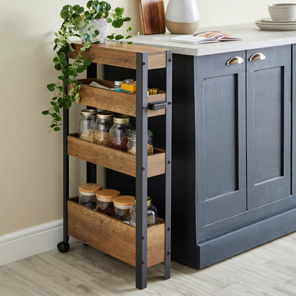 Slim kitchen storage trolley with wooden shelves