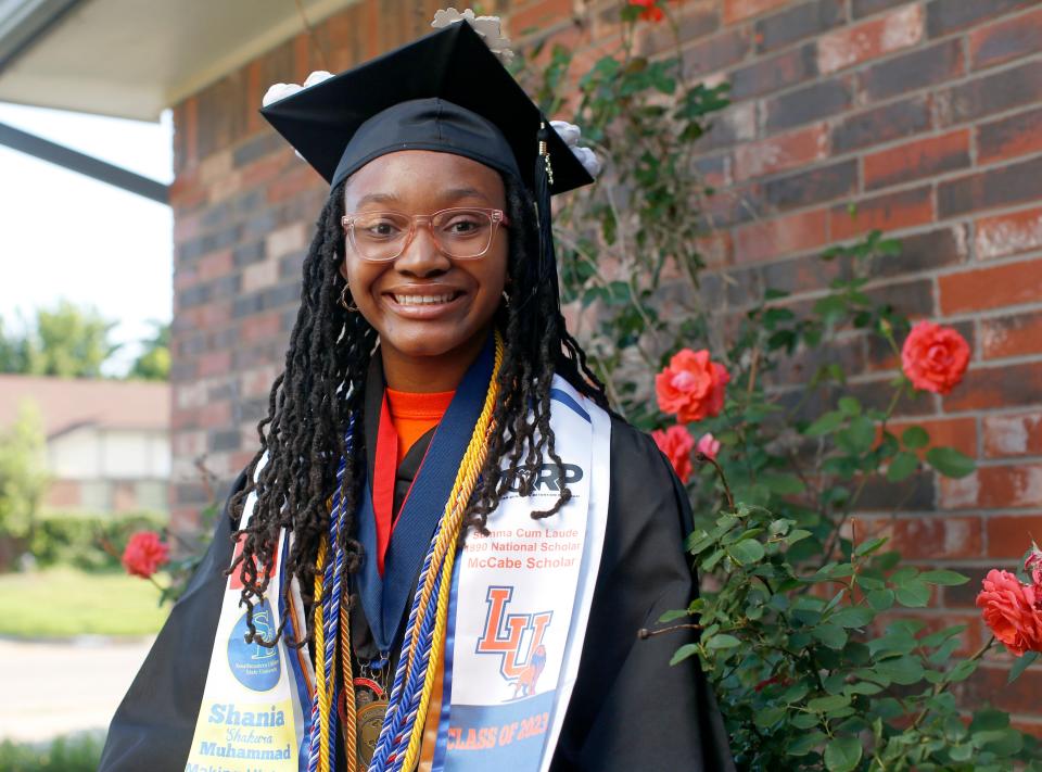 Shania Muhammad,15, poses for photo Wednesday at her home in Oklahoma City.