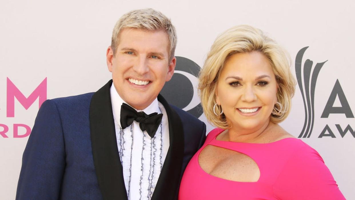 <div>Todd Chrisley and Julie Chrisley arrive at the 52nd Academy of Country Music Awards held at T-Mobile Arena on April 2, 2017 in Las Vegas. (Photo by Michael Tran/FilmMagic)</div>