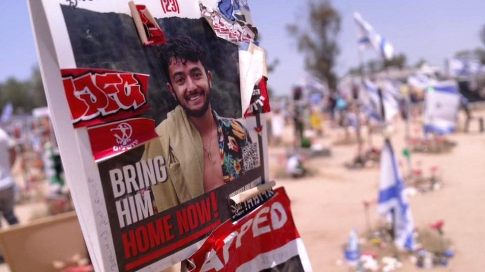 A poster calling for the release of Israeli hostage Hersh Goldberg-Polin at the site of the Nova festival in southern Israel