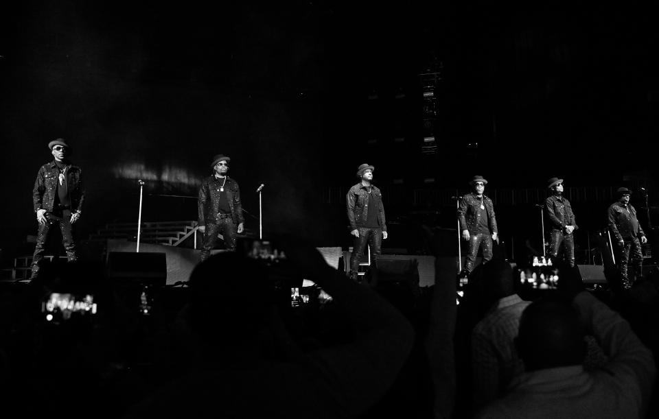 (L-R): Ralph Tresvant, Ricky Bell, Johnny Gill, Michael Bivins, Ronnie DeVoe, and Bobby Brown of New Edition perform onstage during 2023 New Edition Legacy Tour