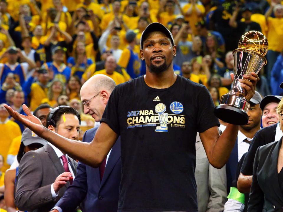 Warriors forward Kevin Durant (35) celebrates after winning the NBA Fianls MVP in game five of the 2017 NBA Finals at Oracle Arena.