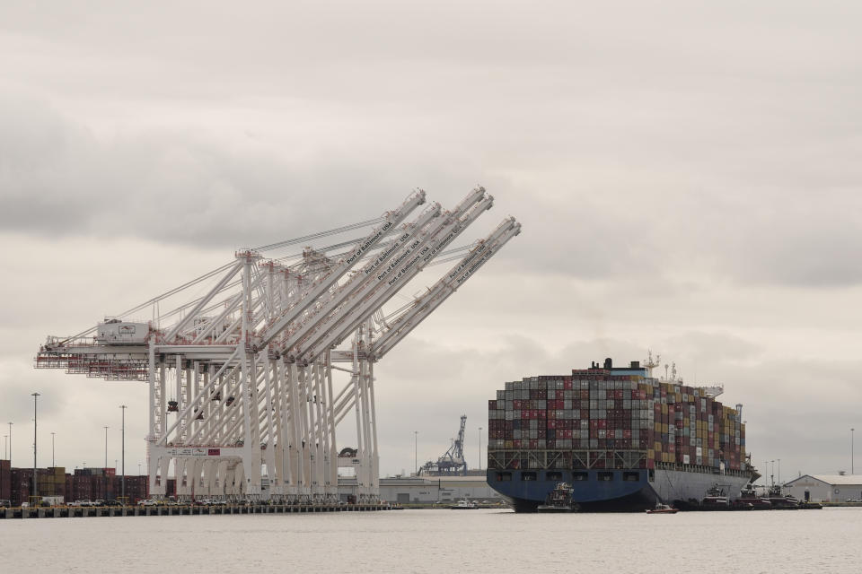 Tugboats escort the cargo ship Dali after it was refloated in Baltimore, Monday, May 20, 2024. The vessel on March 26 struck the Francis Scott Key Bridge causing it to collapse and resulting in the death of six people. (AP Photo/Matt Rourke)