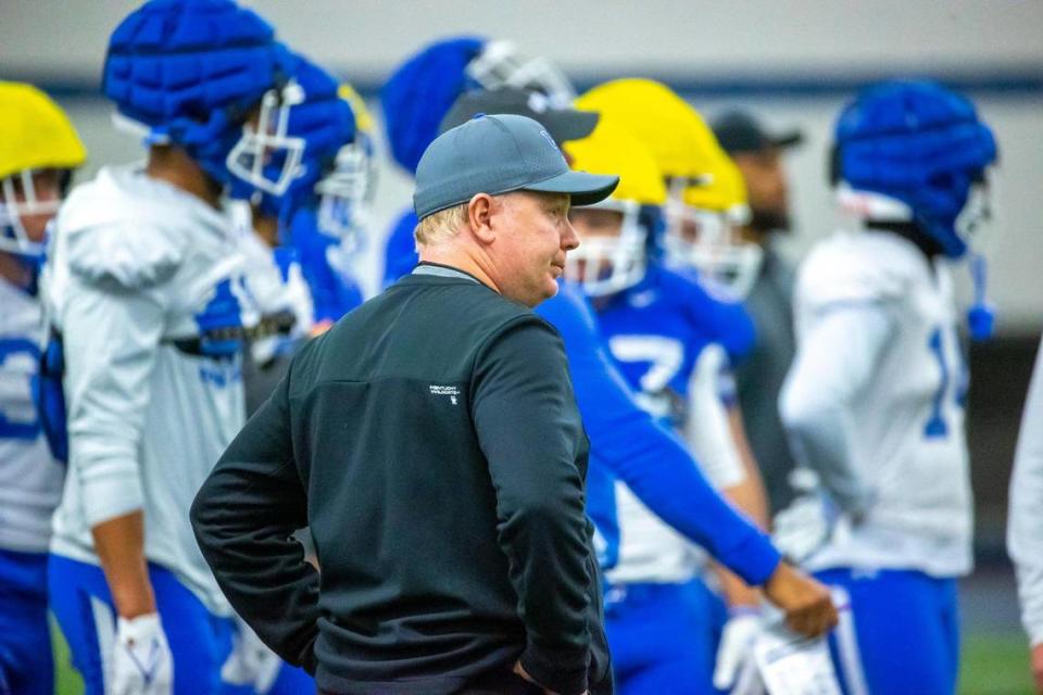 Head coach Mark Stoops kept watch over Tuesday’s open practice, which was only the team’s fourth workout of spring football.