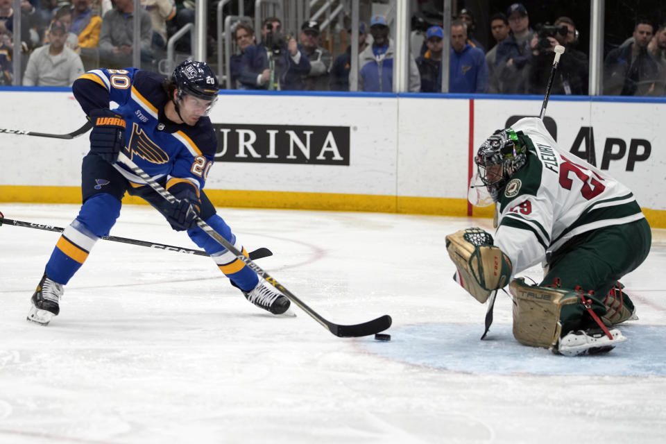 St. Louis Blues' Brandon Saad (20) is unable to score past Minnesota Wild goaltender Marc-Andre Fleury (29) during the second period of an NHL hockey game Wednesday, March 15, 2023, in St. Louis. (AP Photo/Jeff Roberson)