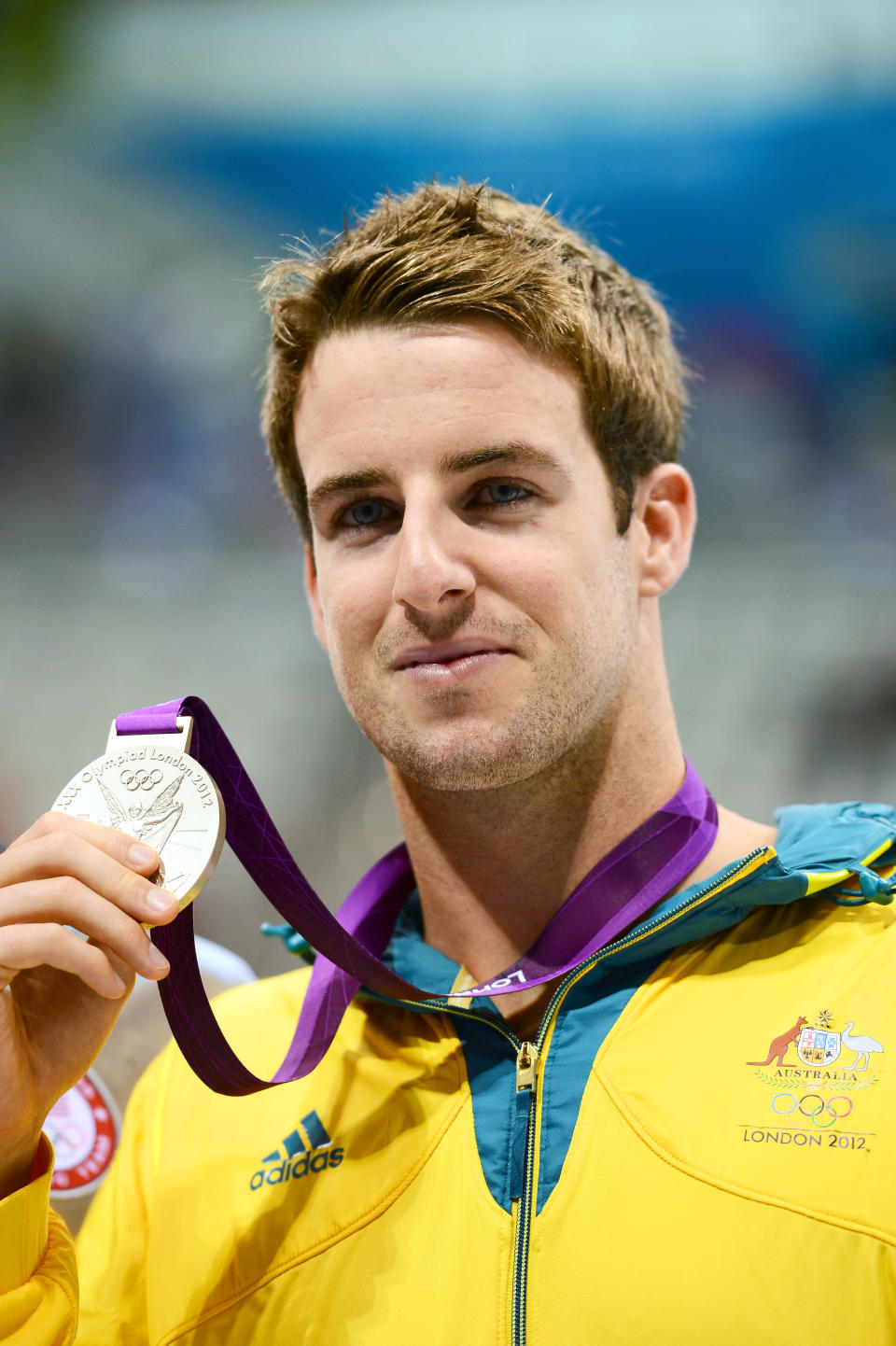 LONDON, ENGLAND - AUGUST 01: Silver medalist James Magnussen of Australia celebrates during the medal cermony for the Men's 100m Freestyle on Day 5 of the London 2012 Olympic Games at the Aquatics Centre on August 1, 2012 in London, England. (Photo by Mike Hewitt/Getty Images)