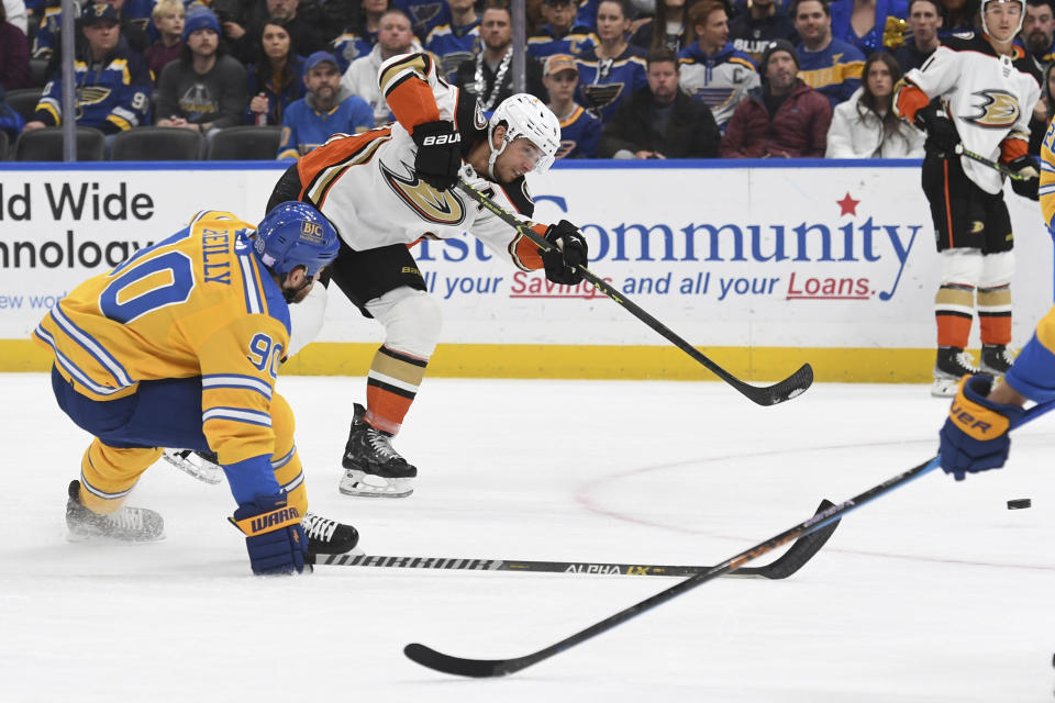 Anaheim Ducks' Cam Fowler shoots the puck against the St. Louis Blues during the first period of an NHL hockey game, Monday, Nov. 21, 2022, in St. Louis. (AP Photo/Michael Thomas)