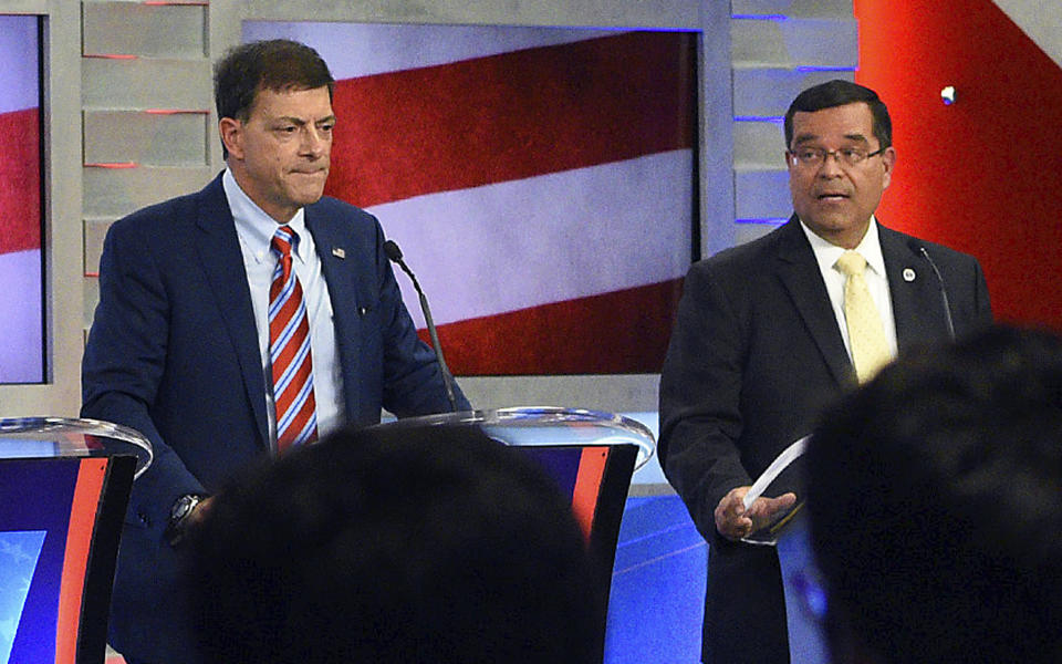 FILE - In this Sept. 7, 2018 file photo, New Hampshire Republicans Stewart Levenson, left, and state Rep. Steve Negron participate in the 2nd Congressional District debate at Saint Anselm College in Manchester, N.H. Levenson conceded the race to Negron in the Sept. 11 Republican primary. (Thomas Roy/The Union Leader via AP, Pool, File)