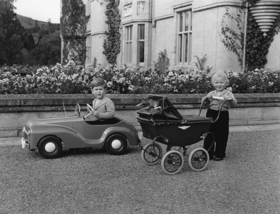 Prince Charles and Princess Anne played together on the grounds of Balmoral Castle on September 1, 1952.