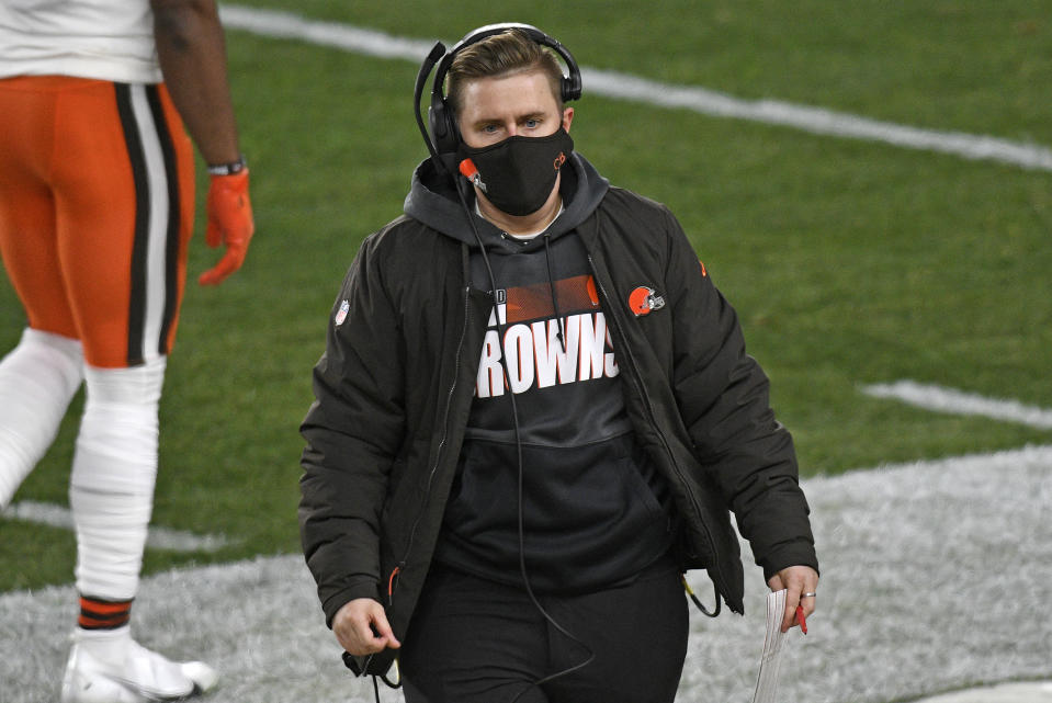 Cleveland Browns coach Callie Brownson walks on the sideline during the first half of an NFL wild-card playoff football game against the Pittsburgh Steelers in Pittsburgh, Sunday, Jan. 10, 2021. (AP Photo/Don Wright)