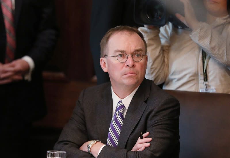 Acting White House Chief of Staff Mulvaney listens during Trump cabinet meeting at the White House in Washington