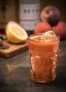 <p><strong>Ingredients</strong></p><p>1 oz Reyka vodka<br>1 oz Sailor Jerry rum<br>.5 oz lemon juice<br>.5 oz peach juice or nectar<br>Angostura bitters</p><p><strong>Instructions</strong></p><p>Combine all ingredients into cocktail shaker except bitters. Shake, double strain, and serve over crushed ice. Garnish with fresh grated nutmeg.</p>