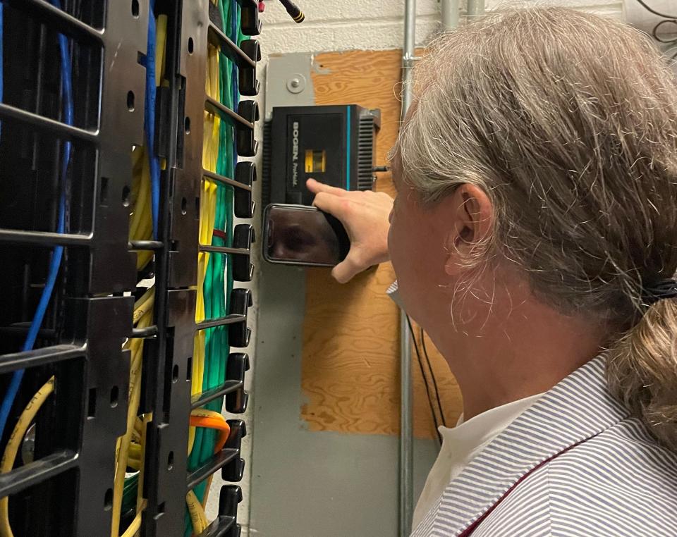 Athens musician Mark Maxwell checks the device that plays the lullaby at St. Mary's Hospital in Athens, Ga. on Tuesday, July 25, 2023. Maxwell, who composed and recorded the lullaby in 1992, installed the device that still uses the original cassette tape. 