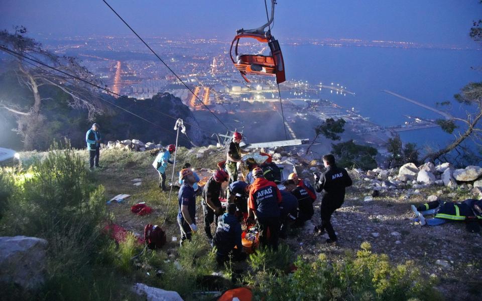 Rescuers at the scene of the cable car collision in Antalya