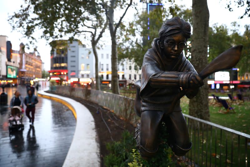 A statue of Harry Potter, based on the JK Rowling novels, is seen after it was unveiled at Leicester Square in London