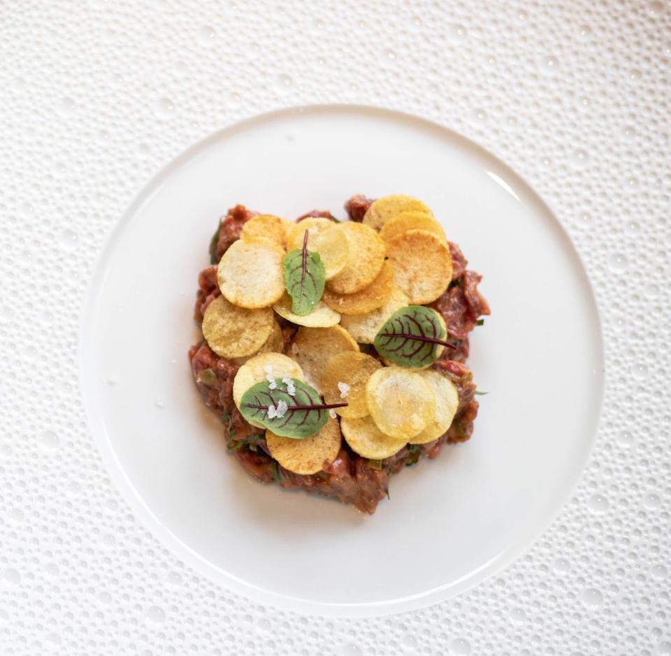 Beef tartare is among the items on the Valentine's Day menu at Cafe Boulud.