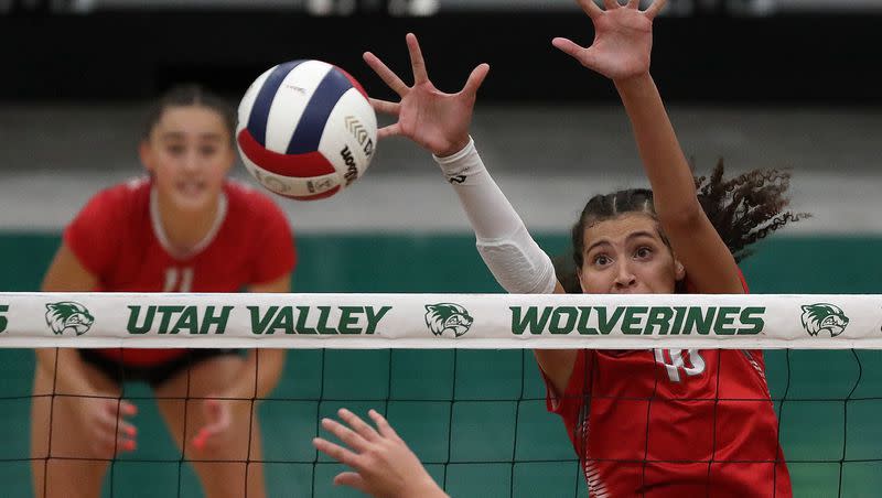Bountiful’s Taylor Harvey reaches for a block during a 5A volleyball state tournament quarterfinal game against Skyline at the UCCU Center in Orem on Thursday, Nov. 2, 2023. On Friday, the two-sport athlete verbally committed to play for defending national champion Texas.