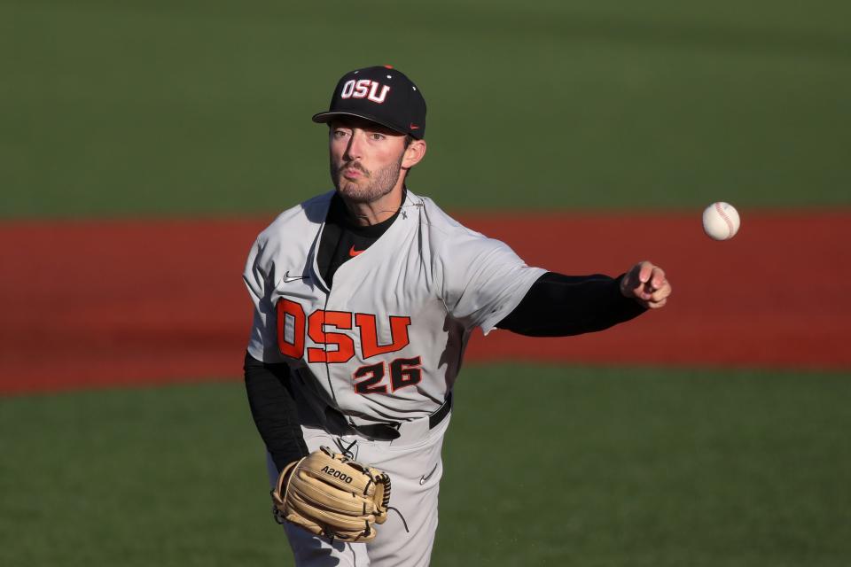 Oregon State pitcher Cooper Hjerpe pitches to Auburn during the first inning of an NCAA college baseball tournament super regional game on Sunday, June 12, 2022, in Corvallis, Ore. (AP Photo/Amanda Loman)