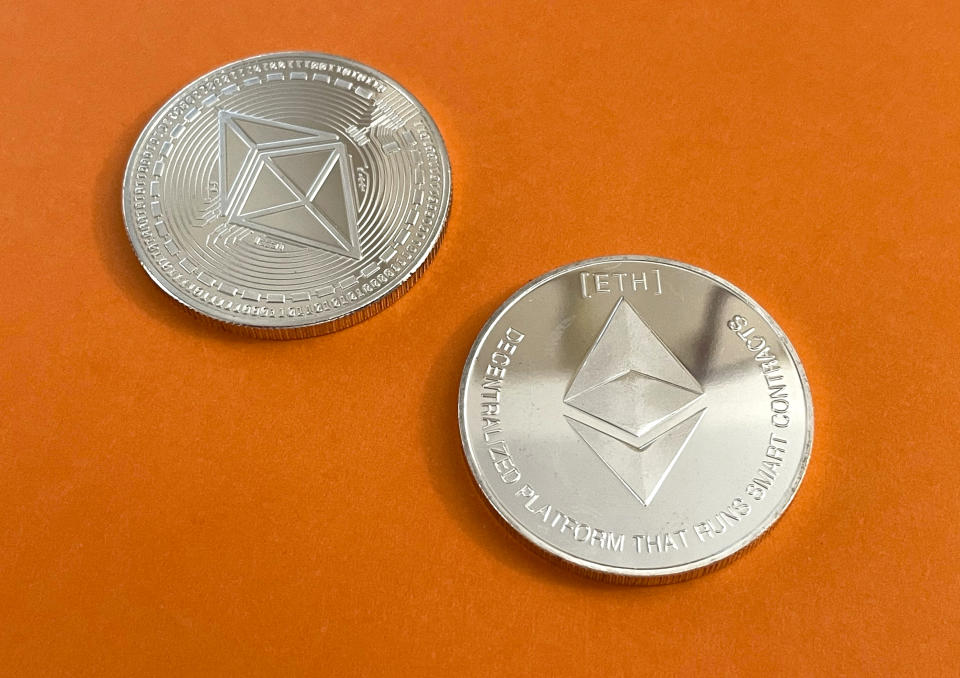 A photo of two Ethereum coins 