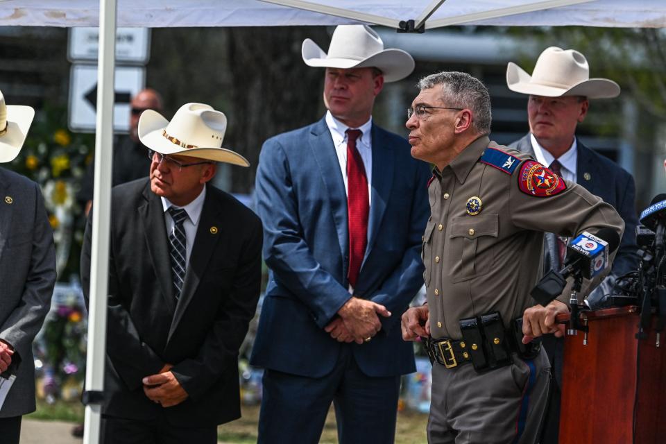 Director and Colonel of the Texas Department of Public Safety Steven C. McCraw listens with other law enforcement officials during a press conference outside Robb Elementary School in Uvalde, Texas, on May 27, 2022.