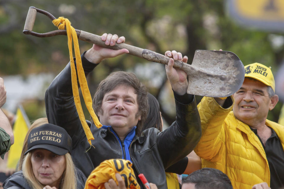 Presidential hopeful of the Liberty Advances coalition, Javier Milei, displays a shovel during a rally in Salta, Argentina, Thursday, Oct. 12, 2023. Elections are set for Oct. 22. (AP Photo/Javier Corbalan)