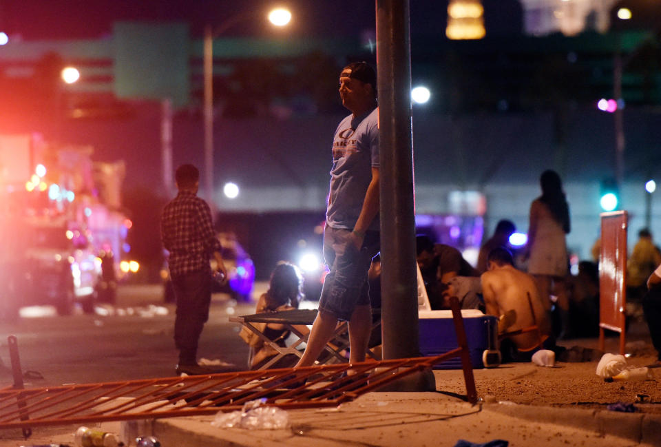 <p>A man stands outside the the Route 91 Harvest country music festival grounds after an active shooter was reported on Oct. 1, 2017 in Las Vegas, Nevada. (Photo: David Becker/Getty Images) </p>