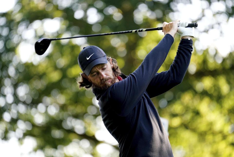 Tommy Fleetwood tees off on the 4th during day one of the 2023 PGA Championship at Wentworth Golf Club in Virginia Water, Surrey, England, Thursday, Sept. 14, 2023. (Zac Goodwin/PA via AP)