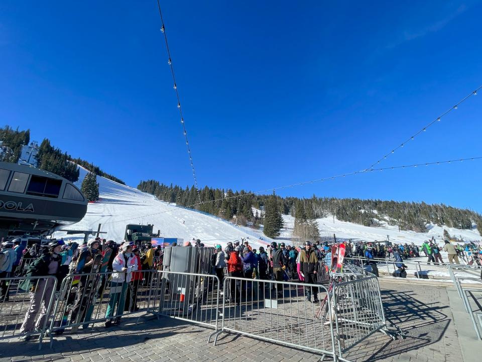 Crowds wait for a lift at the Winter Park Resort in Colorado