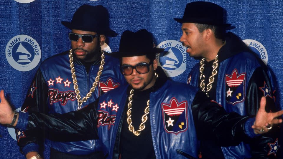 Jason Mizell (Jam Master Jay), Joseph Simmons (Run) and Darryl McDaniels (DMC) pose at the Grammy Awards in the 1980s. - Hulton Archive/Getty Images