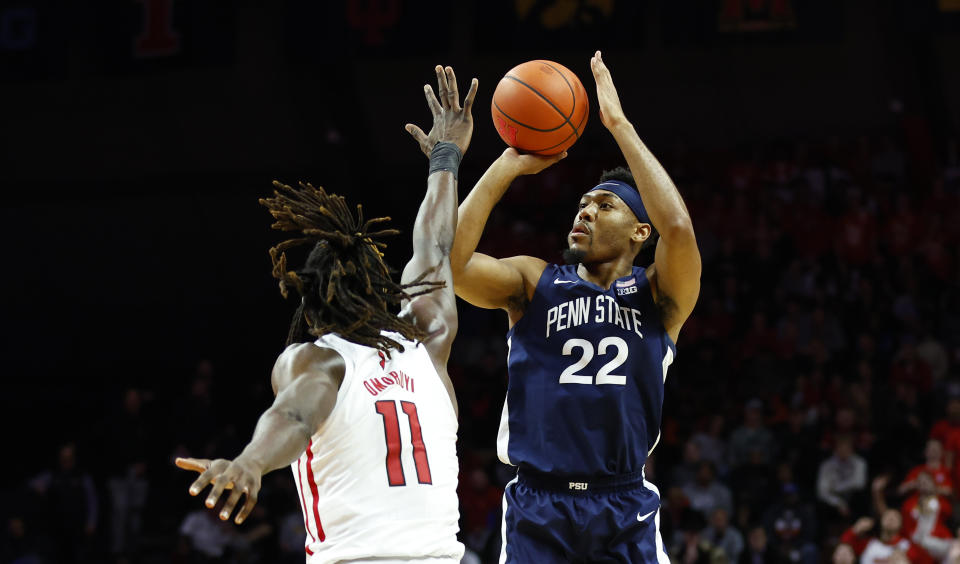 Penn State guard Jalen Pickett (22) shoots over Rutgers center Clifford Omoruyi (11) during the first half of an NCAA college basketball game in Piscataway, N.J. Tuesday, Jan. 24, 2023. (AP Photo/Noah K. Murray)