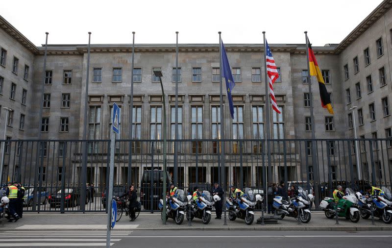 FILE PHOTO: Police waits outside the Finance Ministry in Berlin