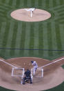 Oakland Athletics pitcher Chris Bassitt (40) works against the Houston Astros' Michael Brantley (23) in the first inning of an opening day baseball game Oakland, Calif., Thursday, April 1, 2021. (AP Photo/Tony Avelar)