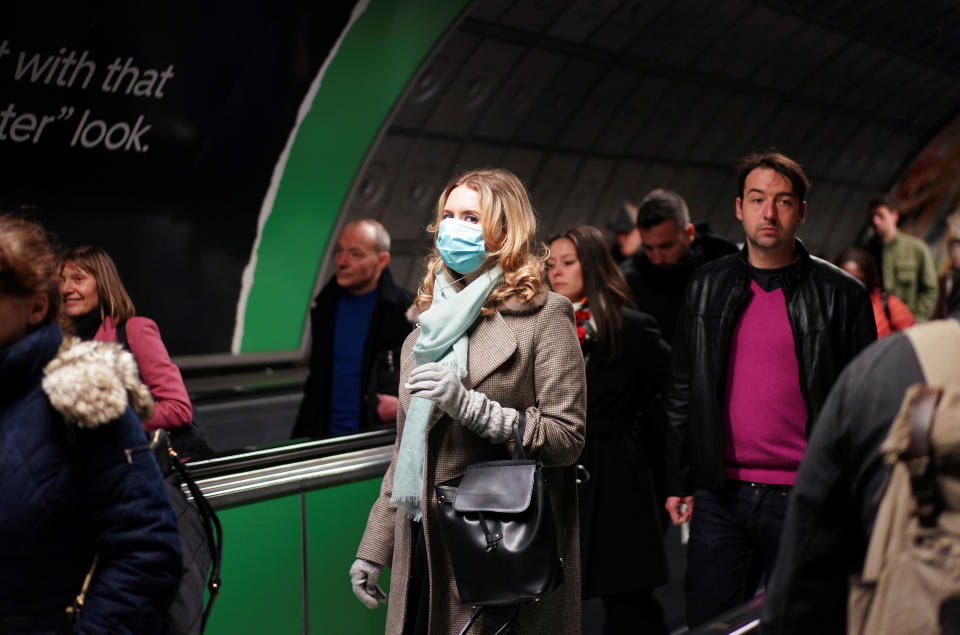 A person is seen wearing a protective face mask on the London Underground, as the number of coronavirus (COVID-19) cases grow around the world, in London, Britain, March 15, 2020. REUTERS/Henry Nicholls