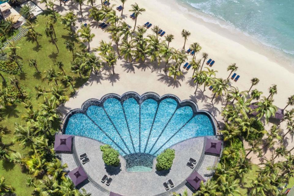 A pool in the shape of a shell because - well, why not? (JW Marriott)