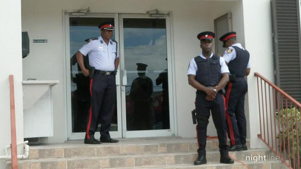 PHOTO: Turks and Caicos officers stand outside a police station. (ABC News/Nightline)