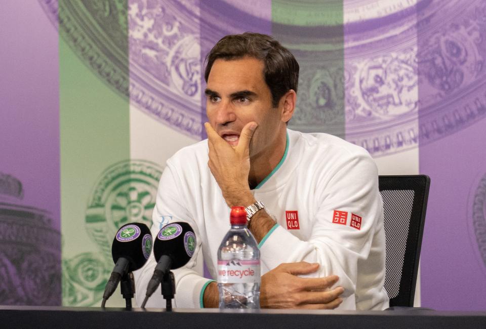 Roger Federer (pictured) attends a press conference after losing to Hubert Hurkacz during their men's quarter-finals match at Wimbledon.