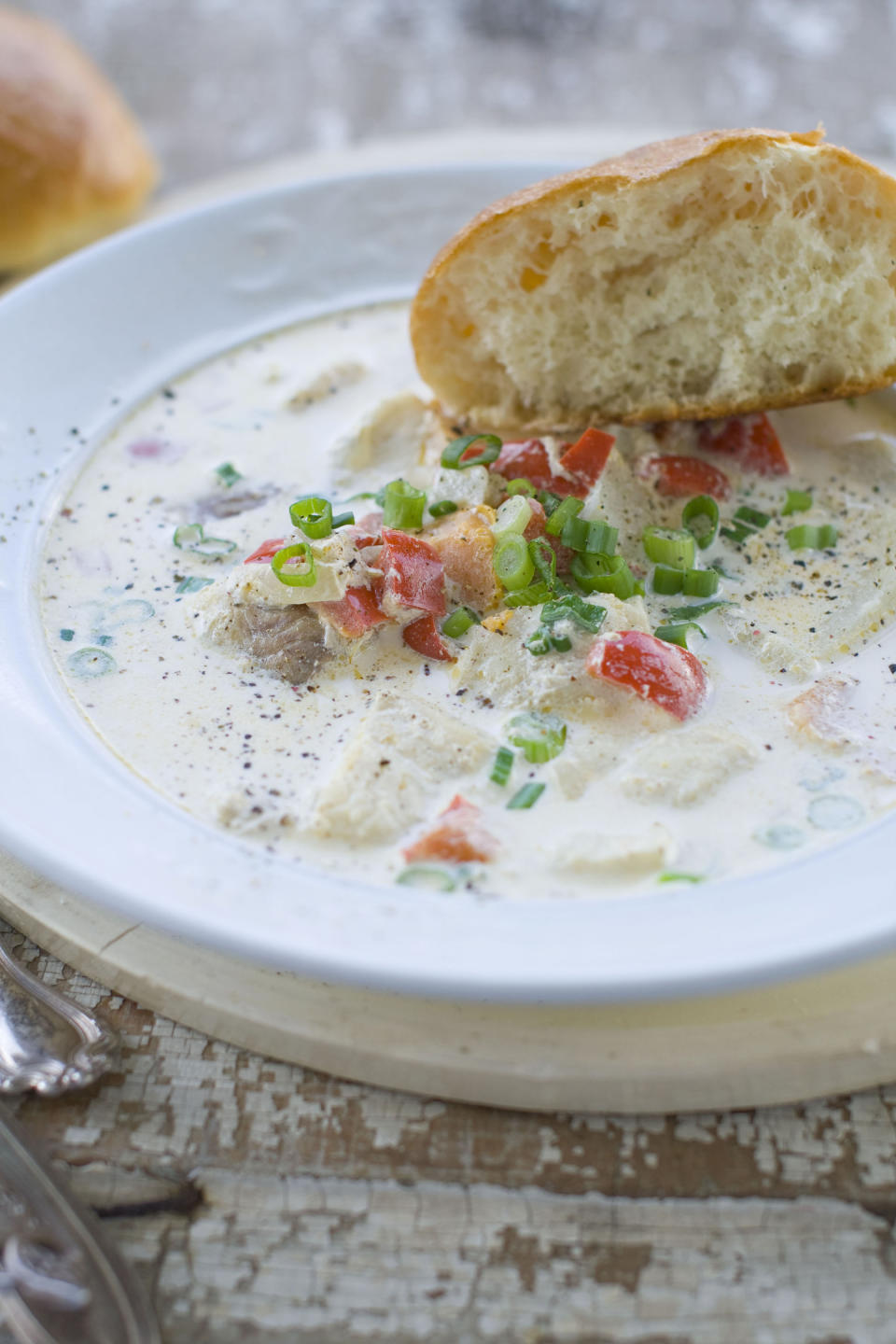 In this March 19, 2012 image, a spring fish chowder, prepared with sweet potatoes, white potatoes, yellow onion, and red bell peppers is seen in Concord NH. (AP Photo/Matthew Mead)