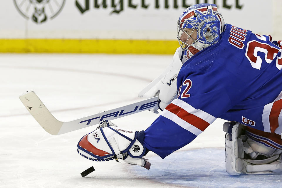 New York Rangers goaltender Jonathan Quick covers up the puck against the Detroit Red Wings in the first period of an NHL hockey game Tuesday, Nov. 7, 2023, in New York. (AP Photo/Adam Hunger)