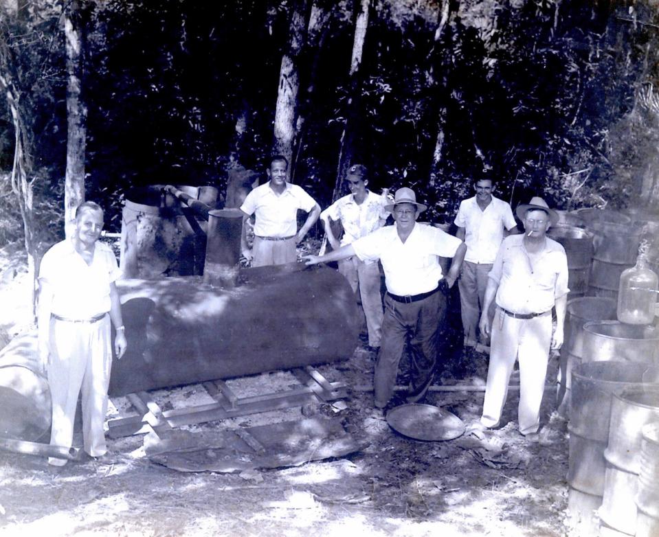 In the early 1950s, long after the end of Prohibition, Chief Deputy Will Knight (far right) and his men busted a moonshine operation somewhere in Clay County.