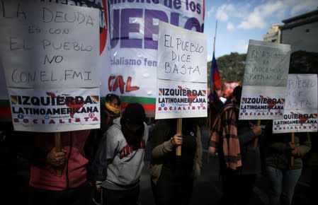 Demonstrators participate in a protest against the government’s economic measures in Buenos Aires