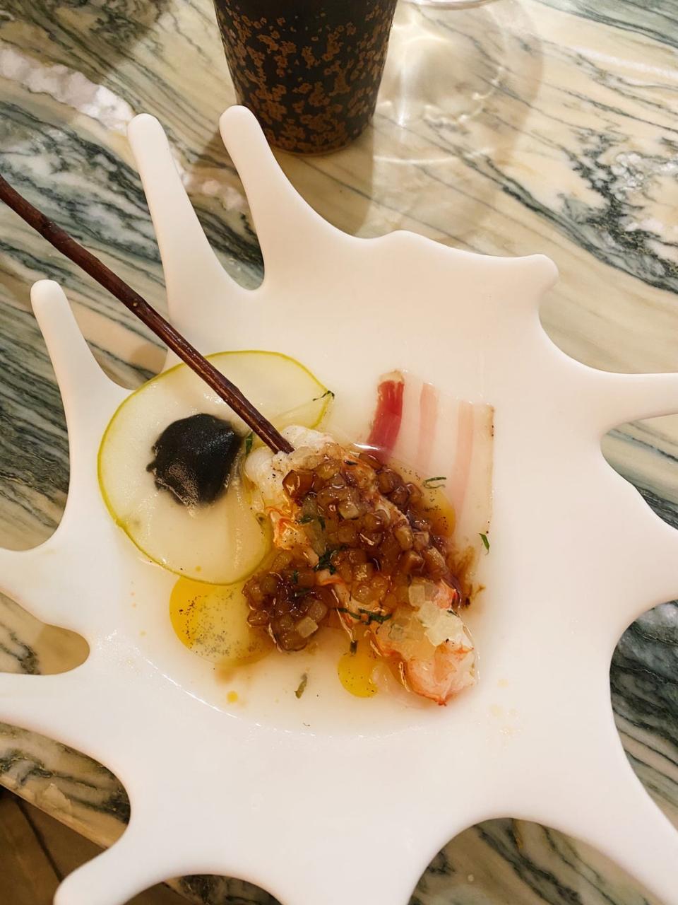 ‘Conquering the beech tree’: Langoustine, pork fat and burnt apple (Molly Codyre)