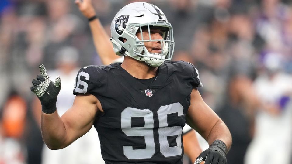 Las Vegas Raiders defensive end Tashawn Bower (96) celebrates after getting a sack against the Minnesota Vikings during a preseason game at Allegiant Stadium