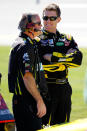 TALLADEGA, AL - OCTOBER 22: Carl Edwards (R), driver of the #99 Subway Ford, talks with crew chief Bob Osborne (L) during qualifying for the NASCAR Sprint Cup Series Good Sam Club 500 at Talladega Superspeedway on October 22, 2011 in Talladega, Alabama. (Photo by Geoff Burke/Getty Images for NASCAR)