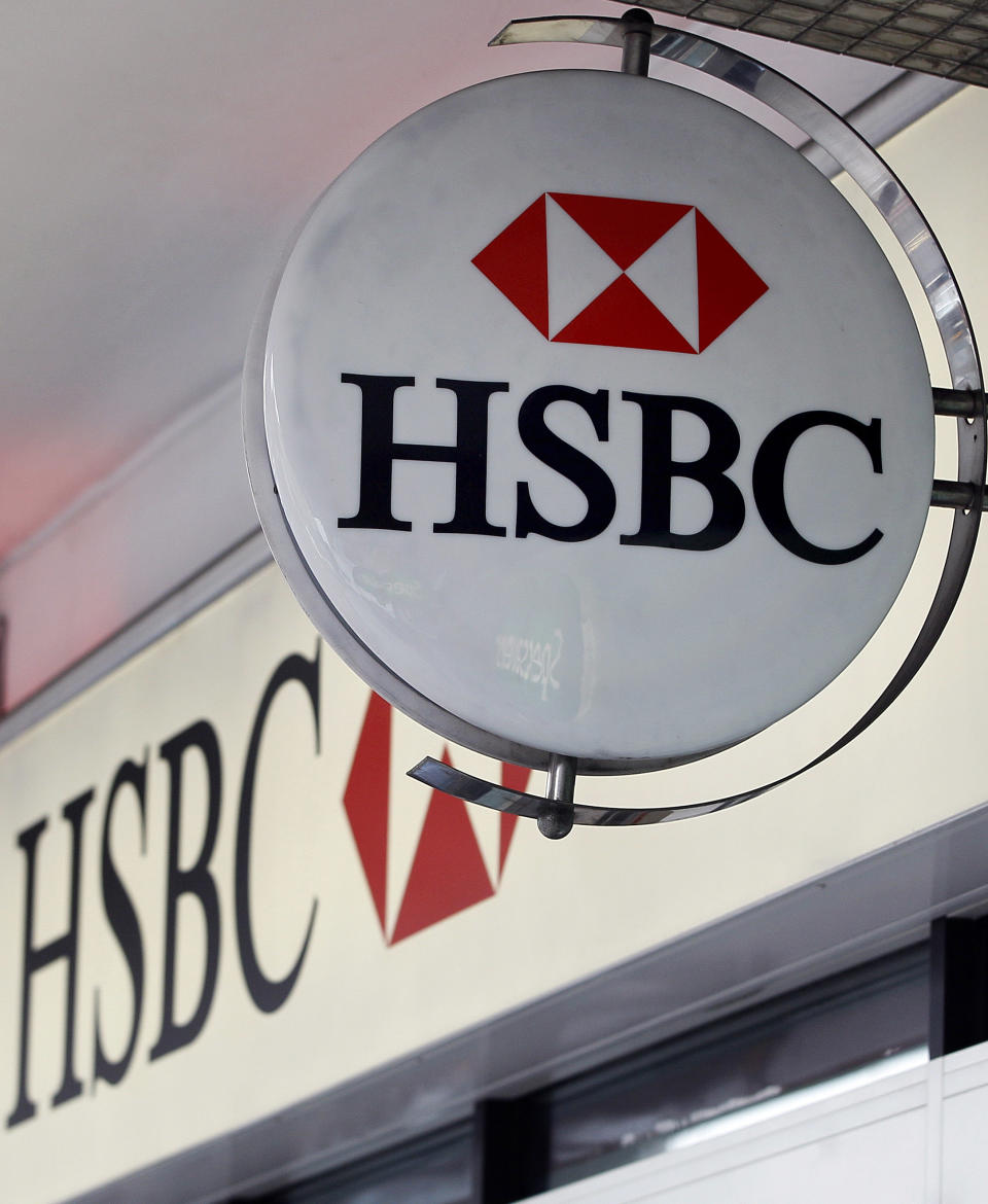 The logo is seen on a branch of HSBC bank in London, Monday, Feb. 27, 2012. Buoyant trading in Asia helped HSBC Holdings PLC, Europe's biggest bank by market value, report a 28 percent increase in full-year profit Monday, a marked contrast to the performance of other big British banks. (AP Photo/Kirsty Wigglesworth)