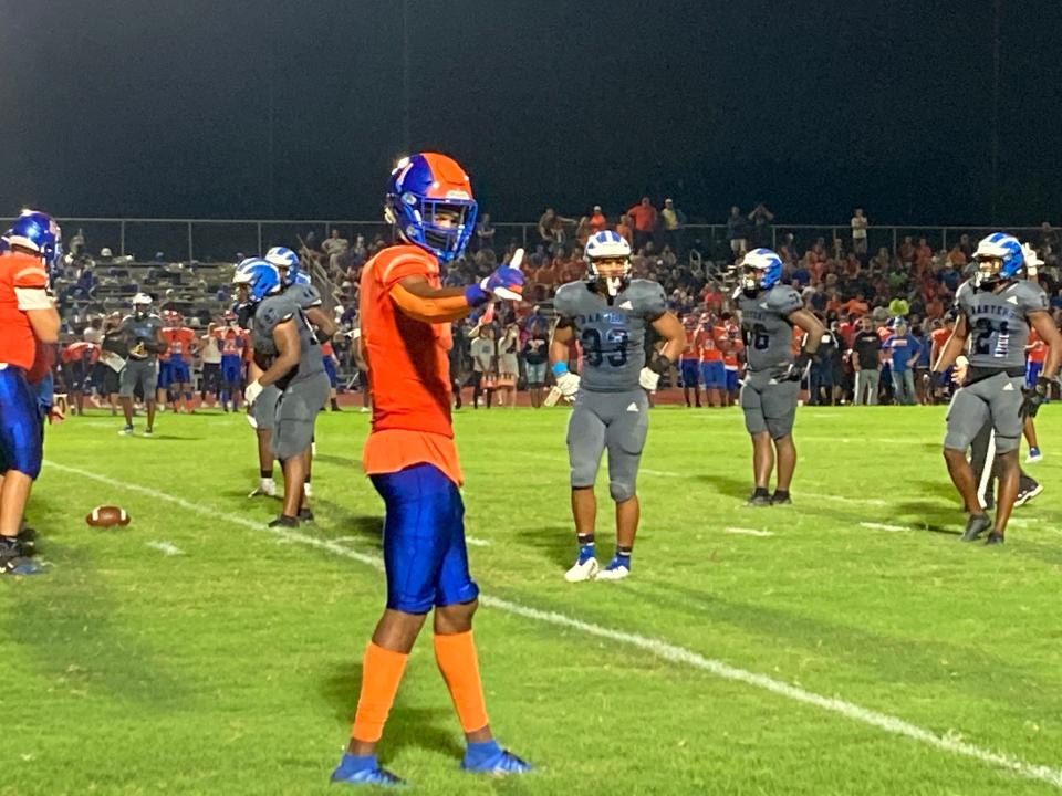 Jayden Gibson signals to an official during West Orange’s game at Apopka on Sept. 3, 2021.